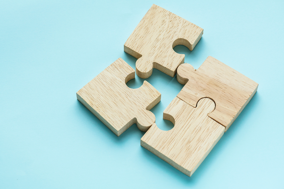 jigsaw-teamwork-concept-macro-shot Assisting buyers, sellers and management